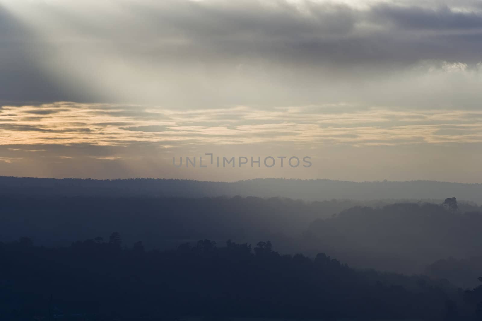 Stunning colorful sunset over countryside landscape by Veneratio