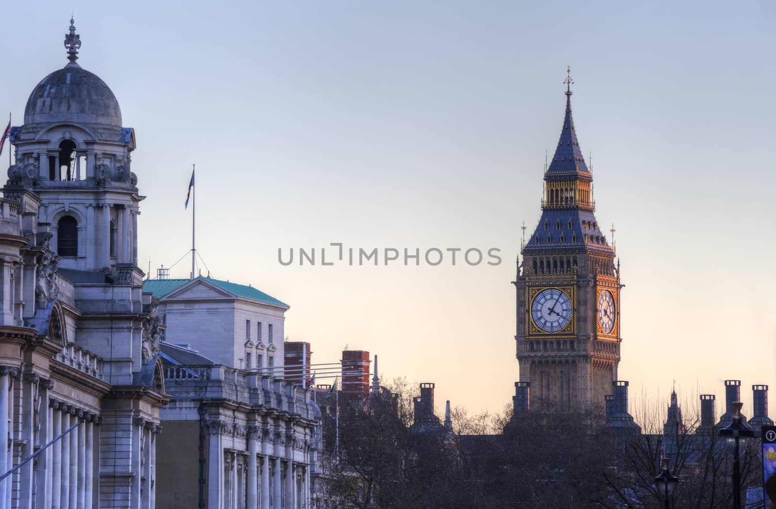 Beuatifully sun lit Big Ben in London at sunset, viewed from Trafalgar Square