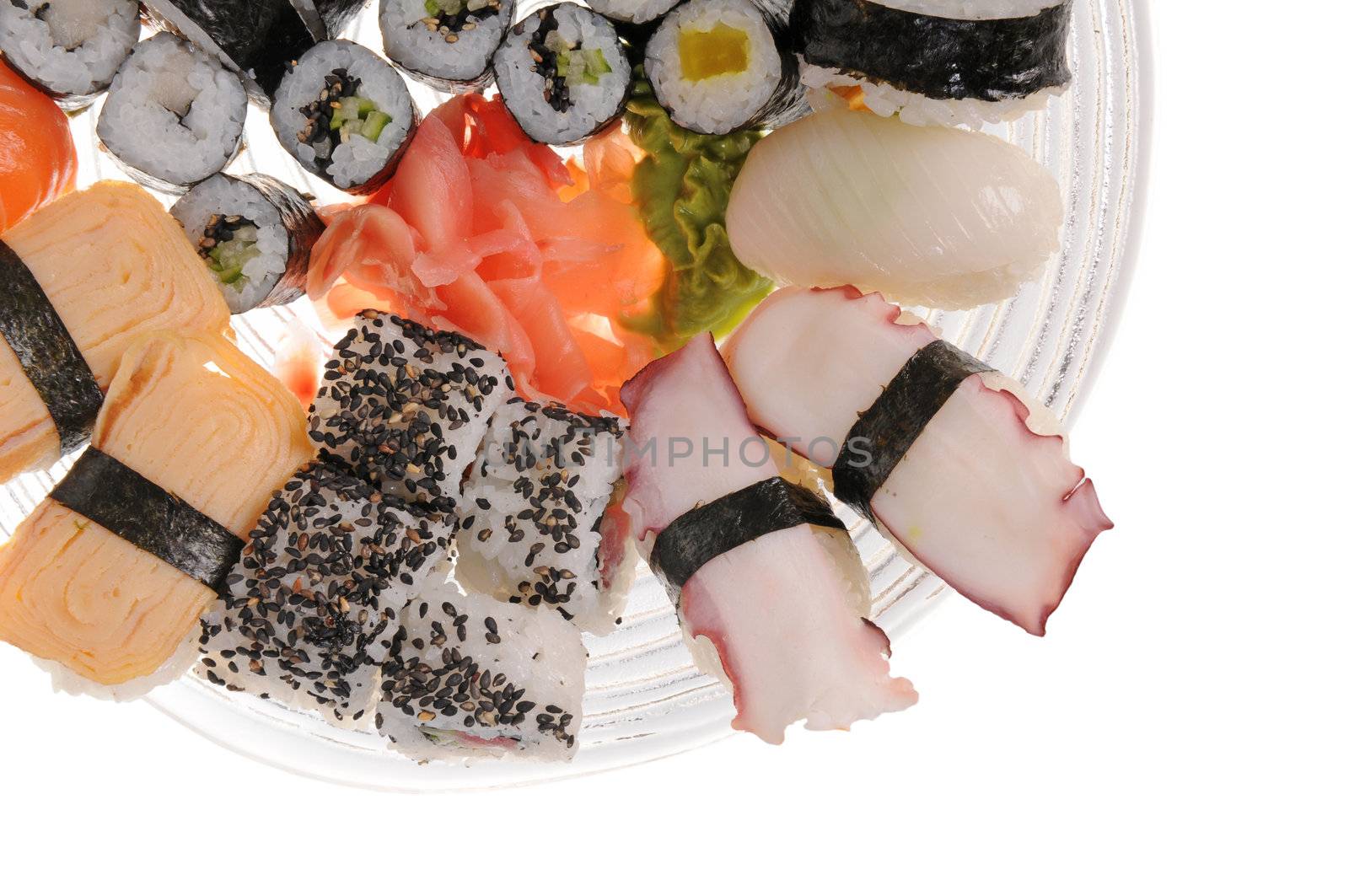 Plate with a selection of sushi isolated on white background