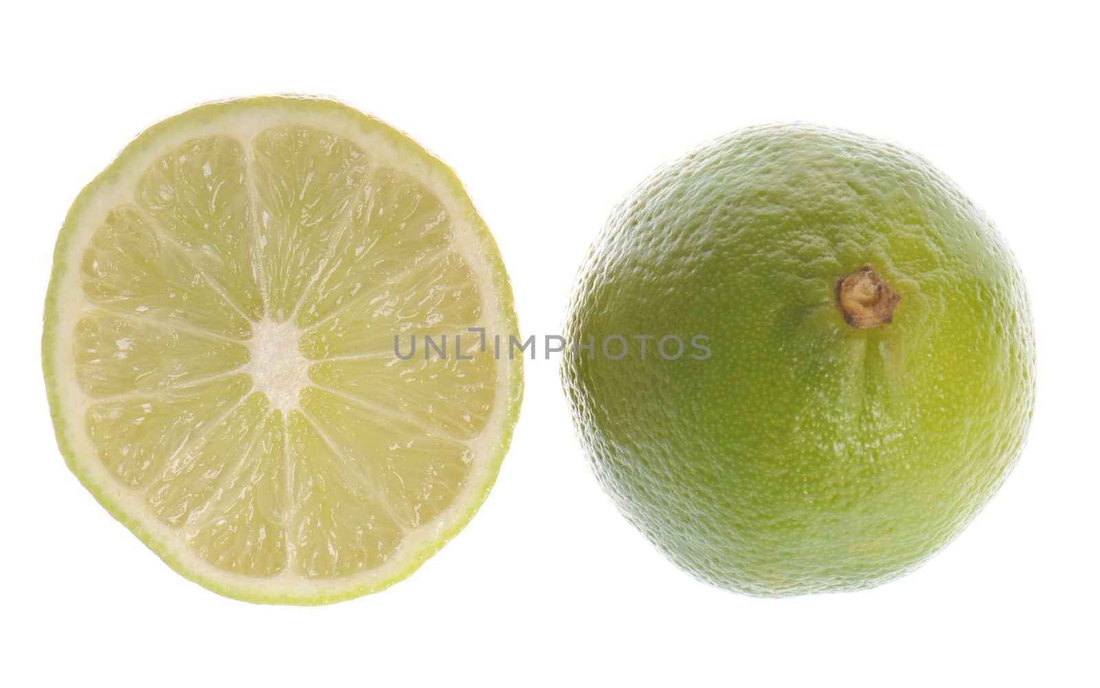 A couple of fresh limes isolated on white background