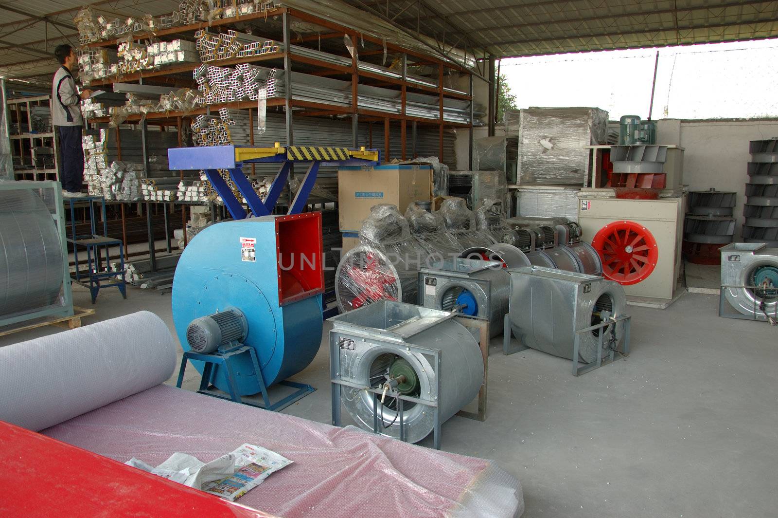 CANTON, CHINA - NOVEMBER 11: One of the biggest manufacturer of auto spray booths and generators in China. Car industry became very important element of Chinese economy growth. Factory tour on November 11, 2010.