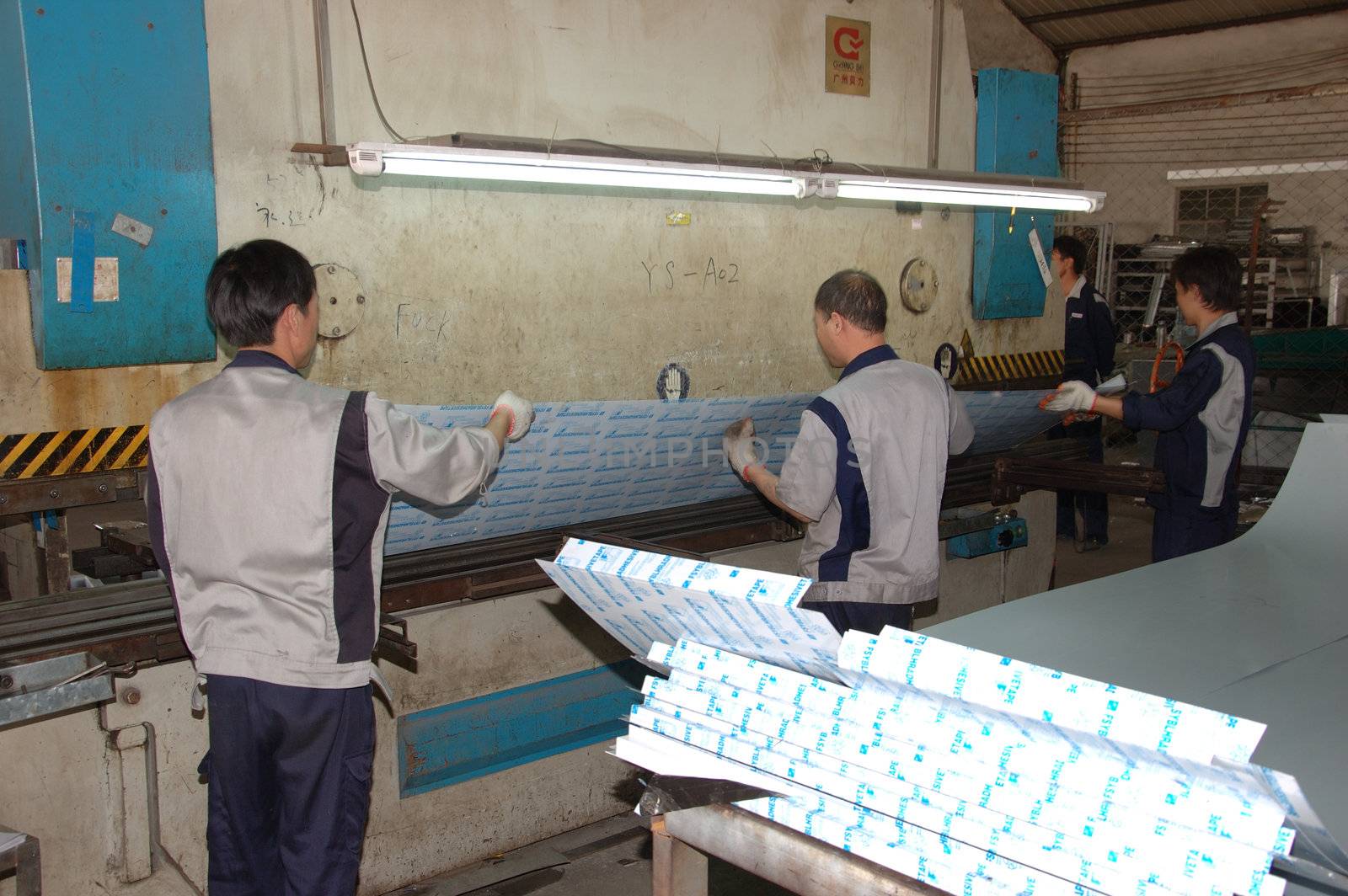 CANTON, CHINA - NOVEMBER 11: One of the biggest manufacturer of auto spray booths and generators in China. Car industry became very important element of Chinese economy growth. Factory tour on November 11, 2010.