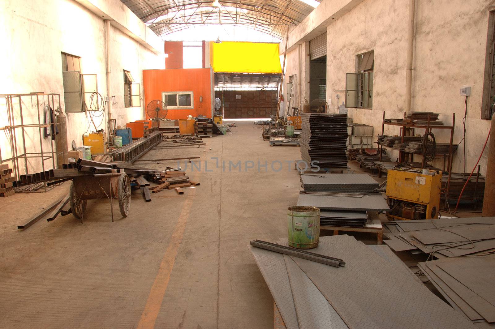 CANTON, CHINA - NOVEMBER 11: One of the biggest manufacturer of auto spray booths and generators in China. Car industry became very important element of Chinese economy growth. Factory tour on November 11, 2010.
