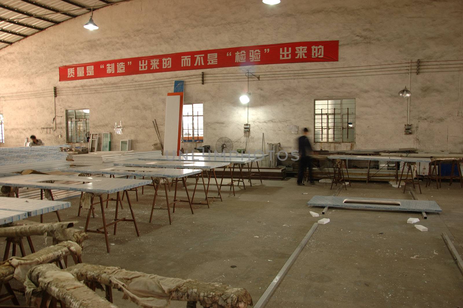 CANTON, CHINA - NOVEMBER 11: One of the biggest manufacturer of auto spray booths and generators in China. Car industry became very important element of Chinese economy growth. Factory tour on November 11, 2010.