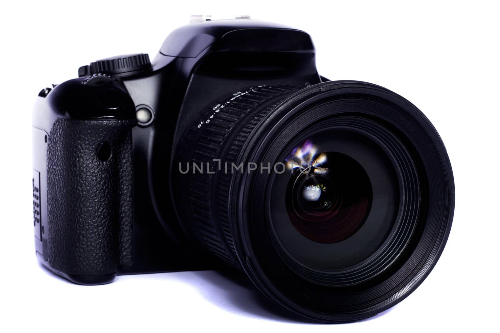 Close view of a modern photographic DSLR camera isolated on a white background.