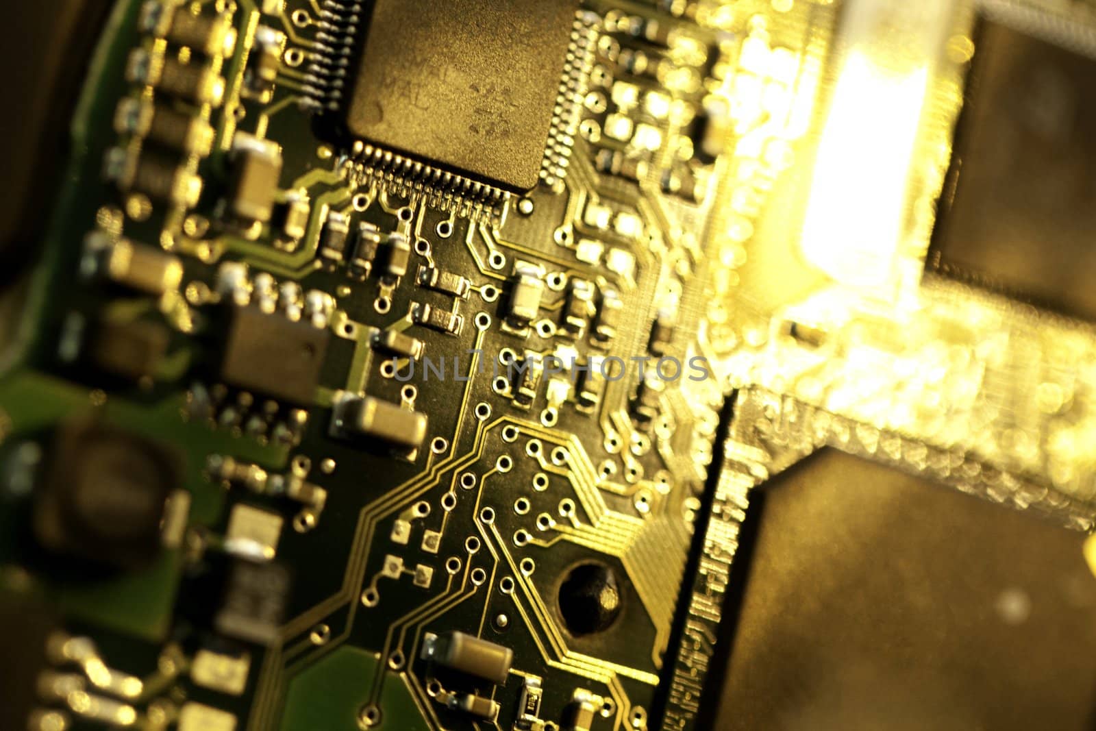 Close view detail of a circuit board with chips.