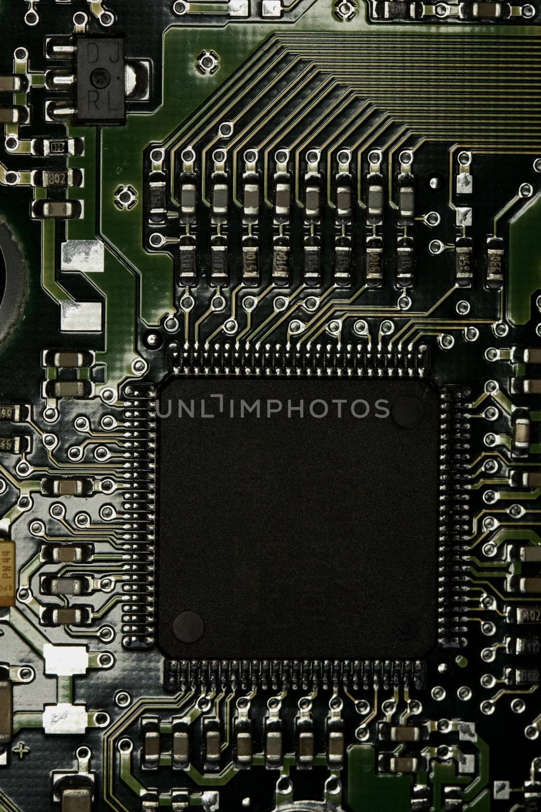 Close view detail of a circuit board with chips.