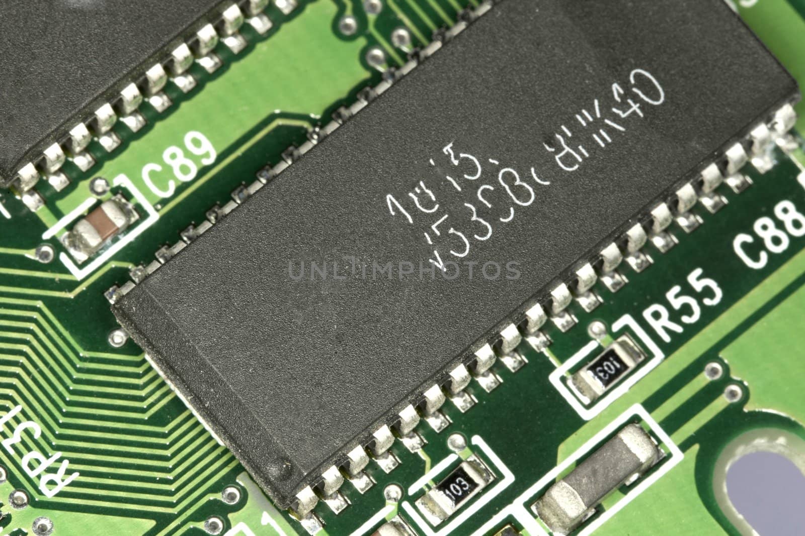 Close view detail of a circuit board with chips.