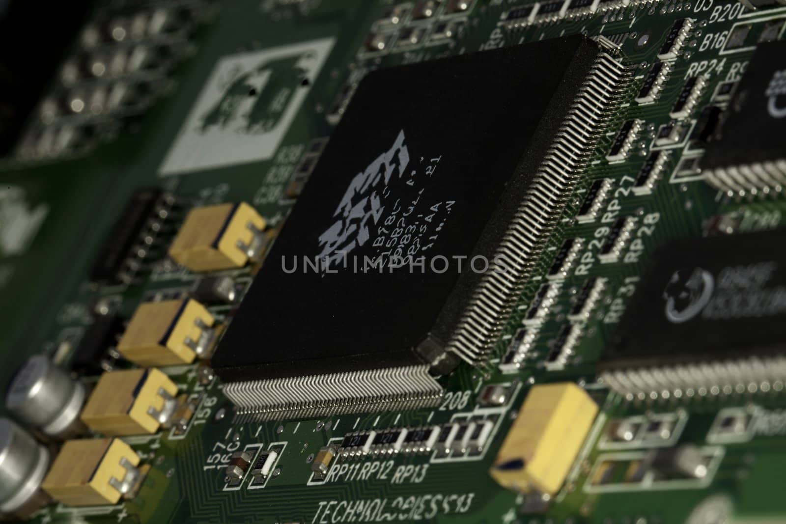 Close view detail of a circuit board with chips.