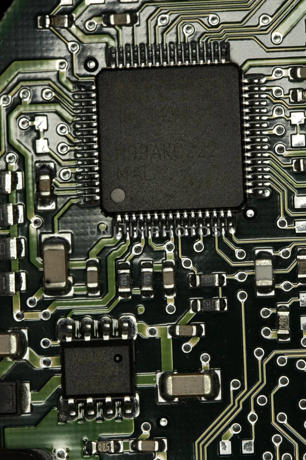 Close view detail of a circuit board with chips.