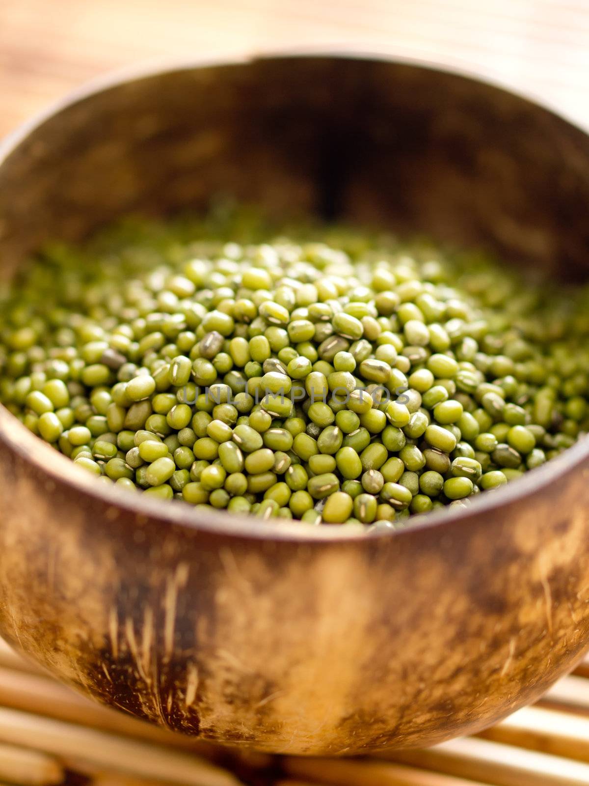 close up of a bowl of green mung beans