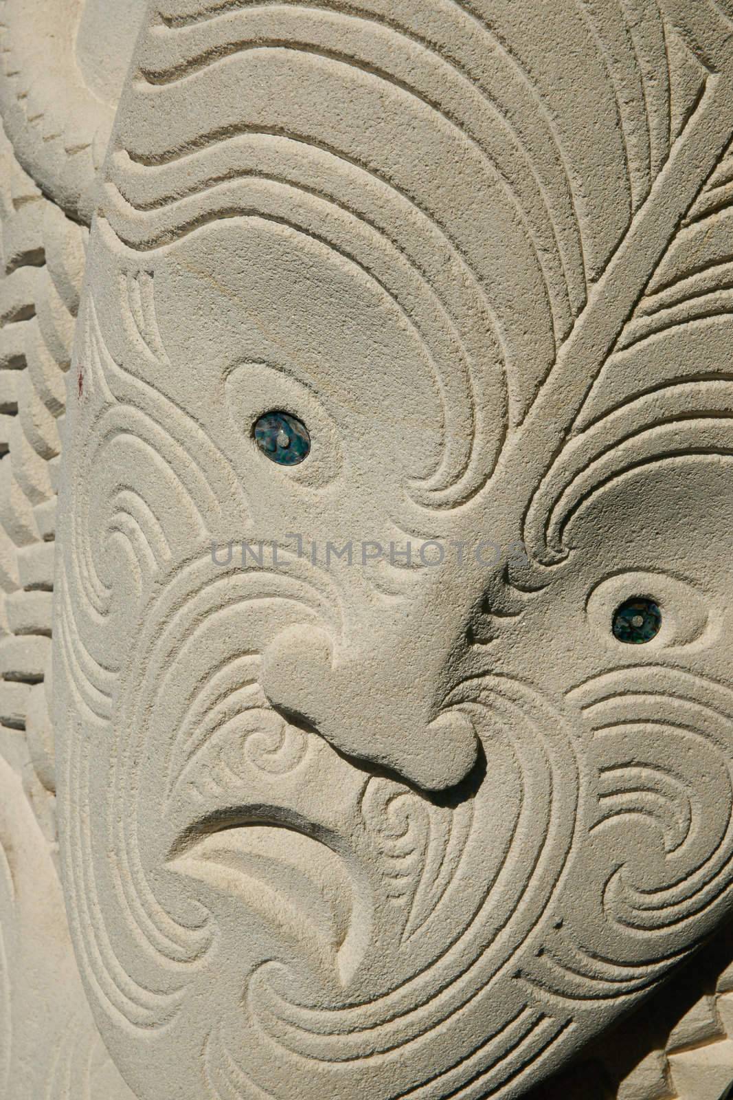 Carved maori face, close up. by brians101