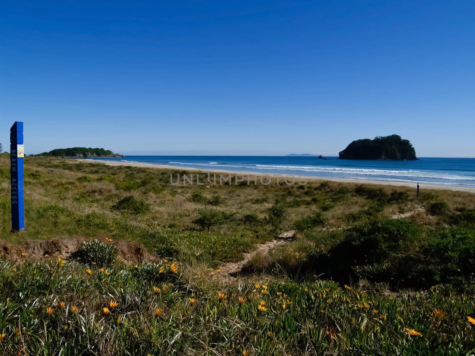 Sea view, under summer blue sky.