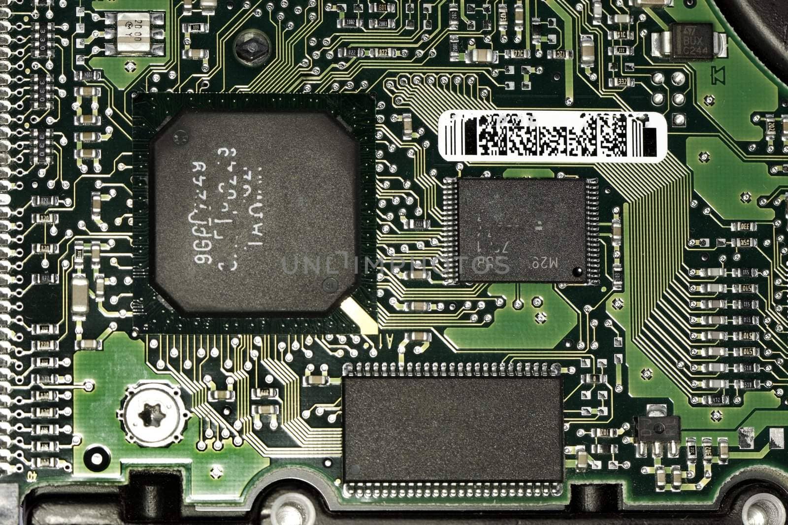 Close view detail of a circuit board with chips.