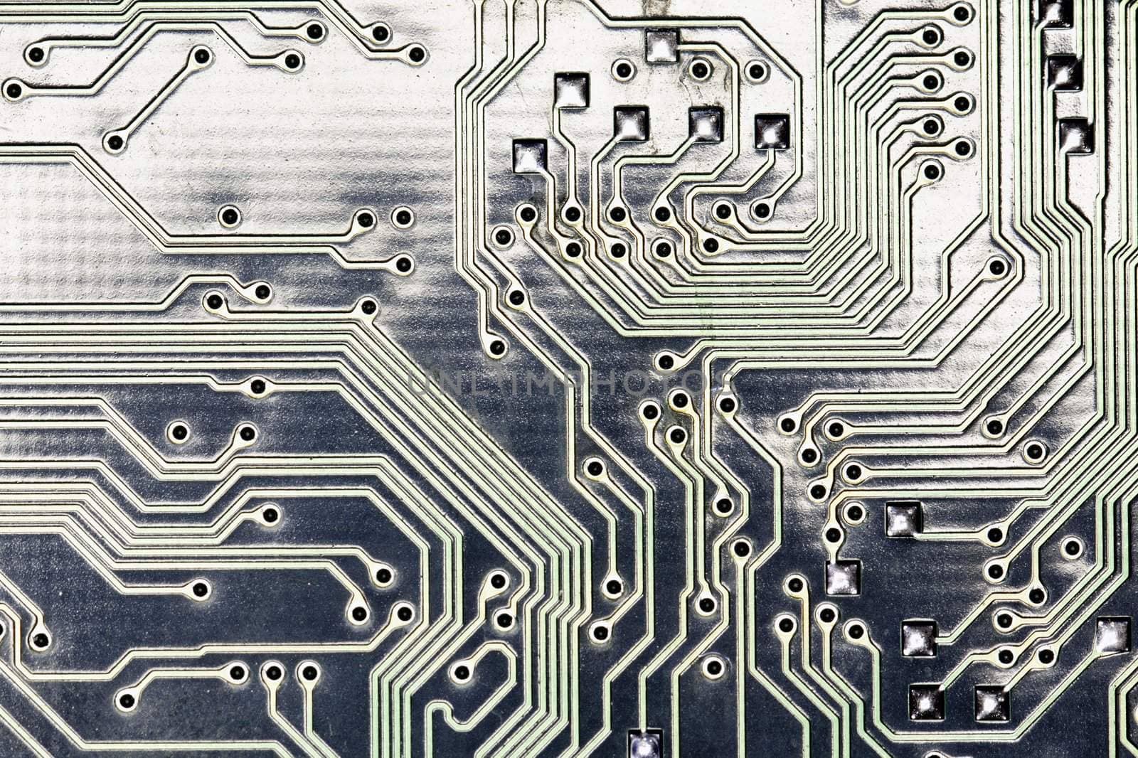 close view detail of   computer circuit chips on a golden light.