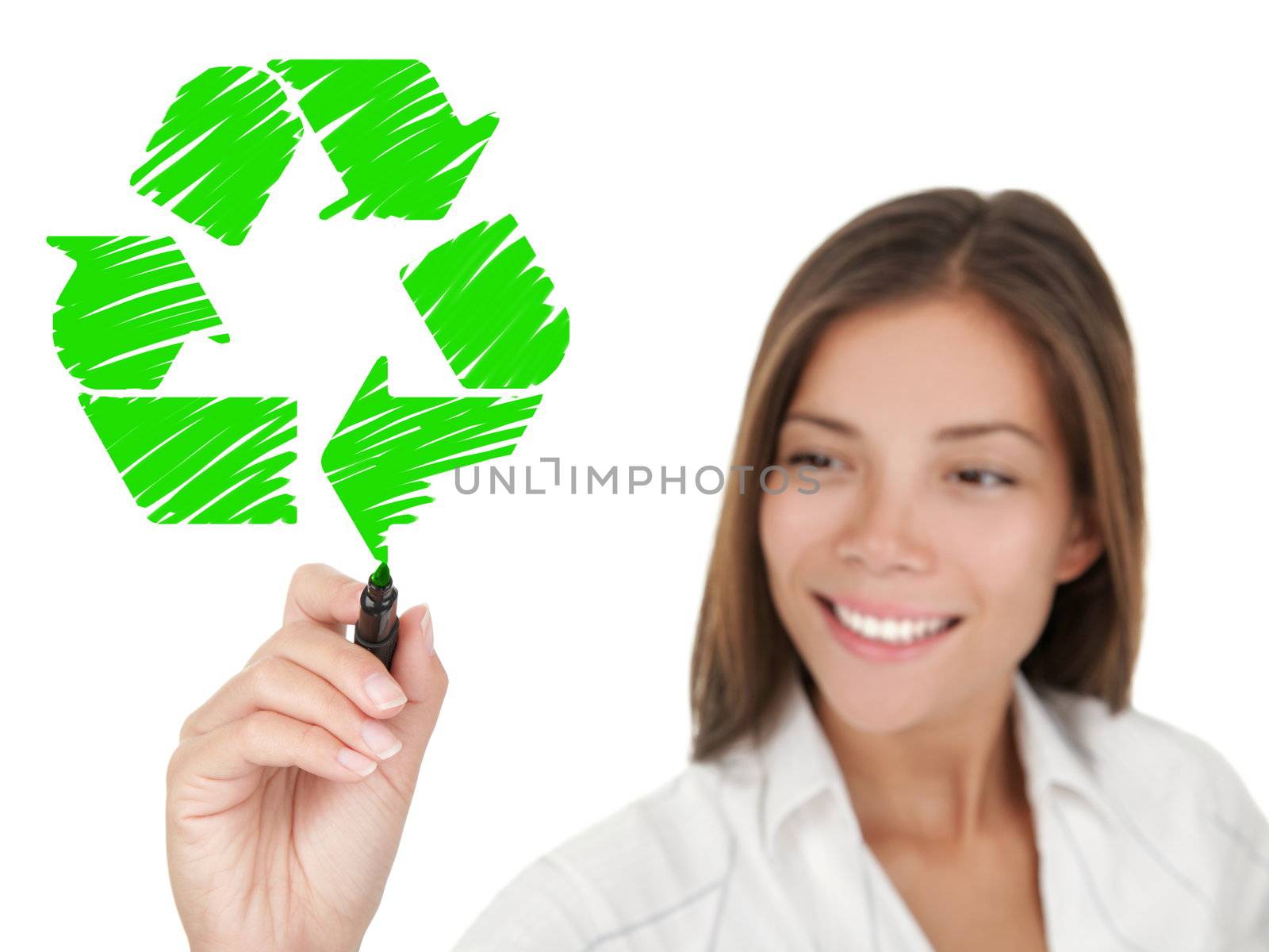 Recycling. Woman drawing recycle sign on copy space. Smiling young business woman smiling on white background. Asian / Caucasian female model.