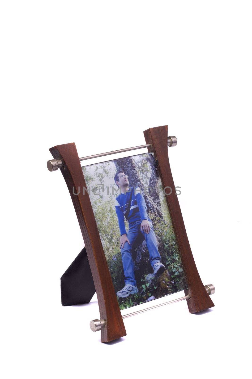 Close up view of a picture frame with photo isolated on a white background.