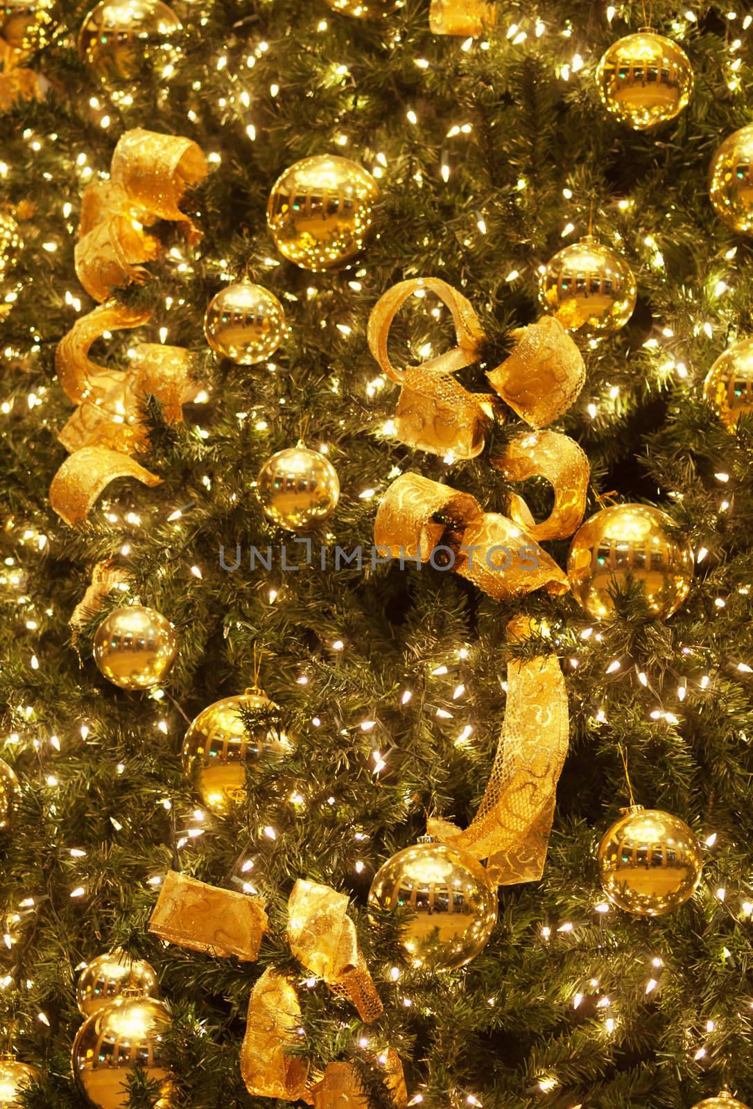 Background made of Christmas tree decorated with golden balls