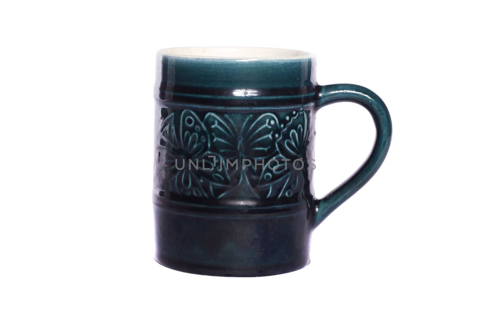 Close view detail of a retro mug isolated on a white background