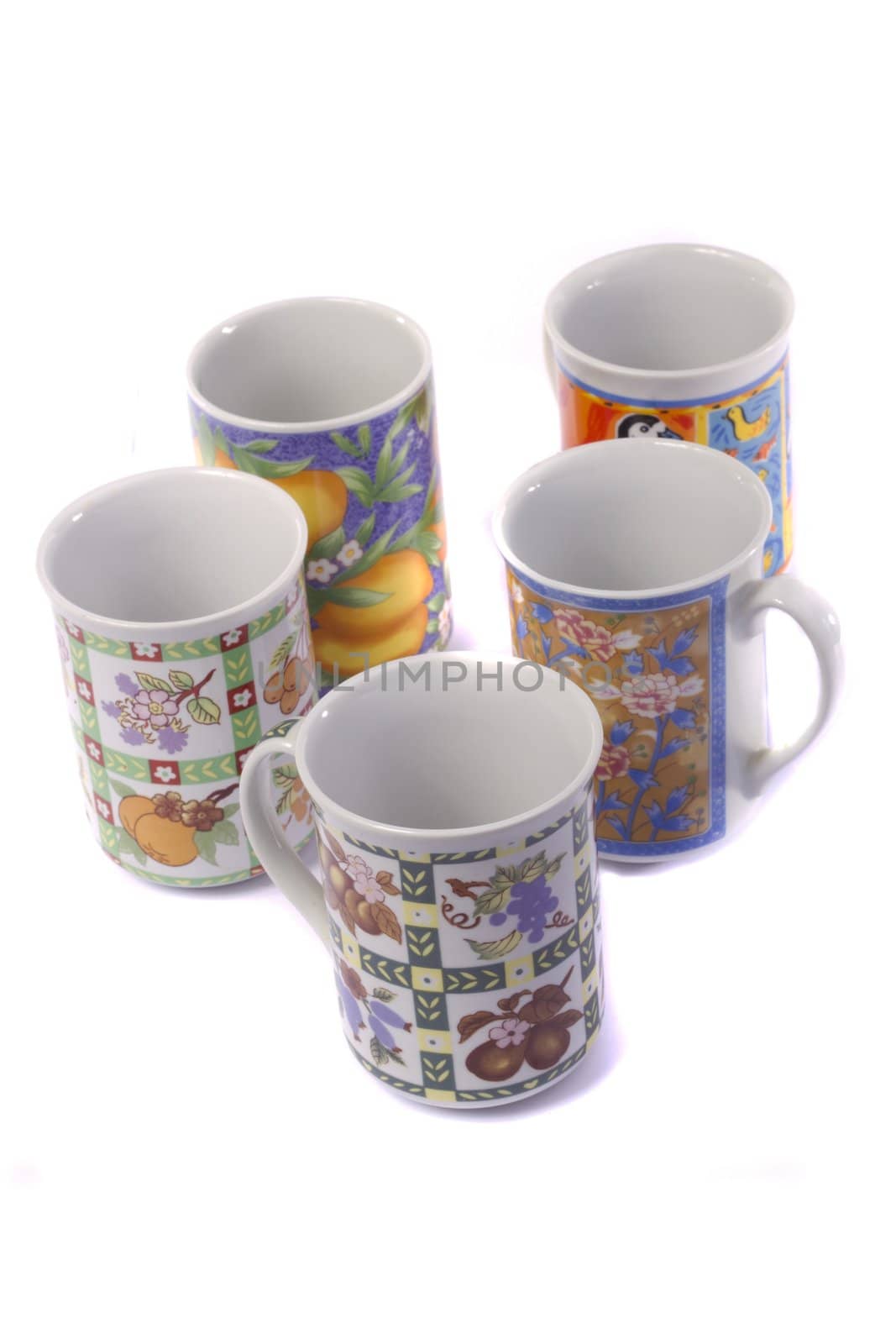 Close up view detail of some breakfast mugs isolated on a white background.