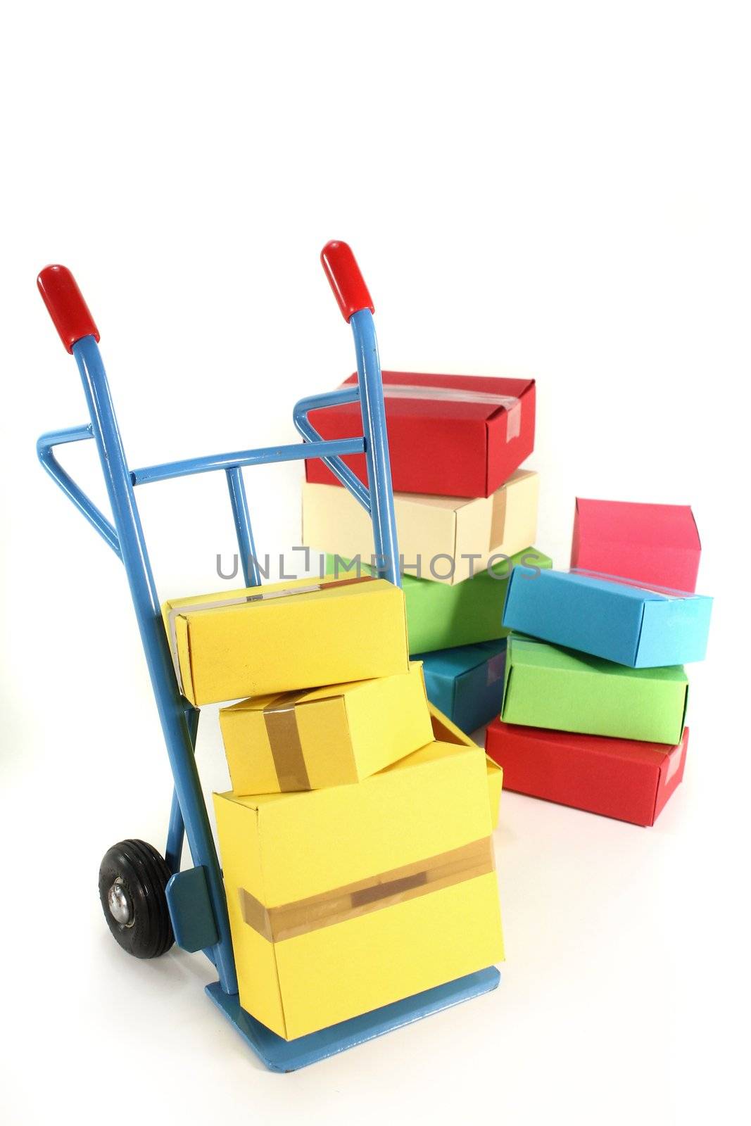 a hand truck with various packages on a white background