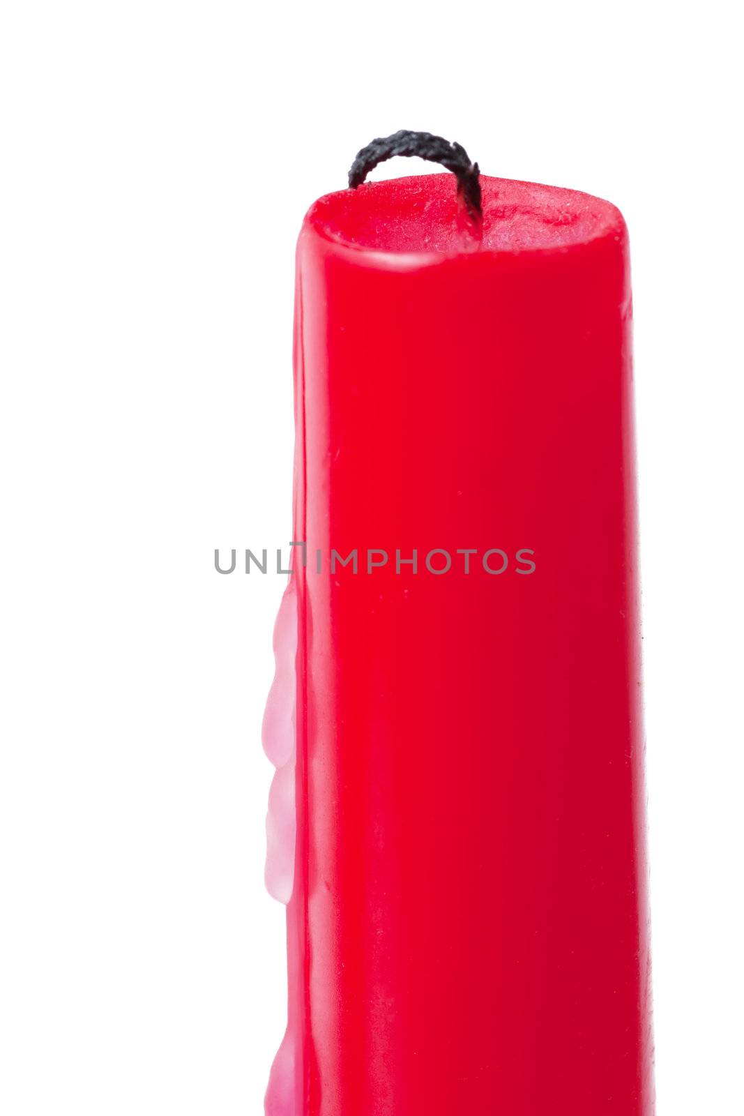 Unlit candle isolated on the white