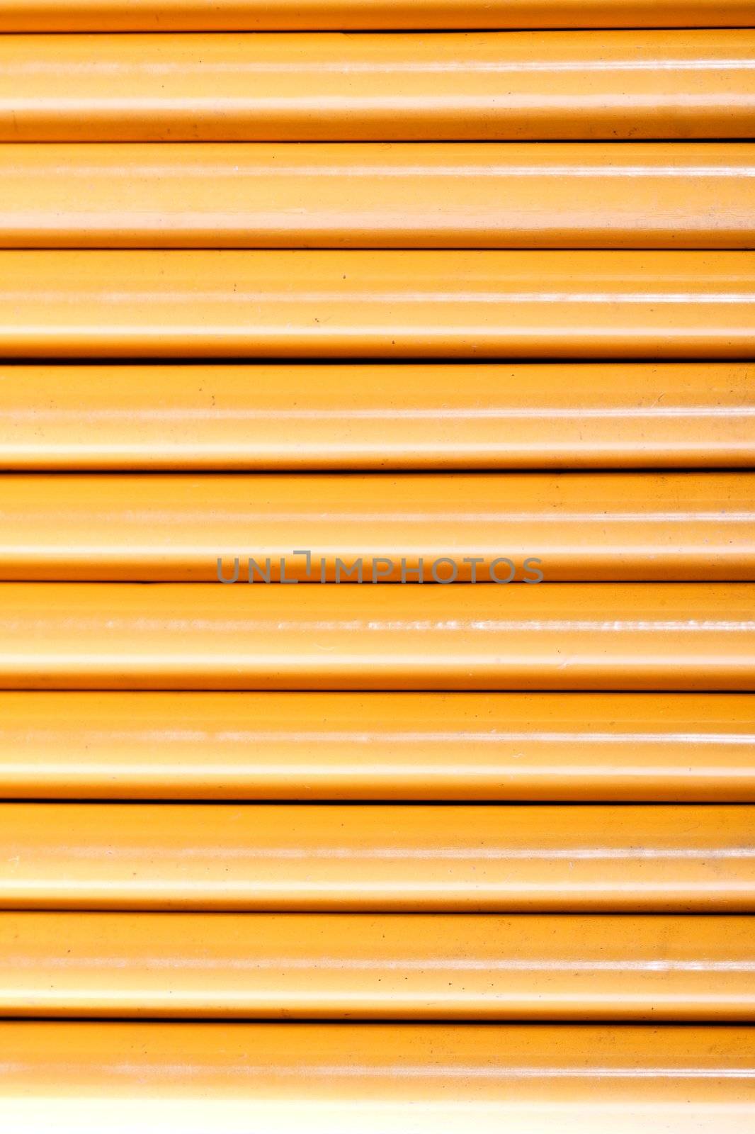 Close up view of a bunch of yellow pencils isolated on a white background.
