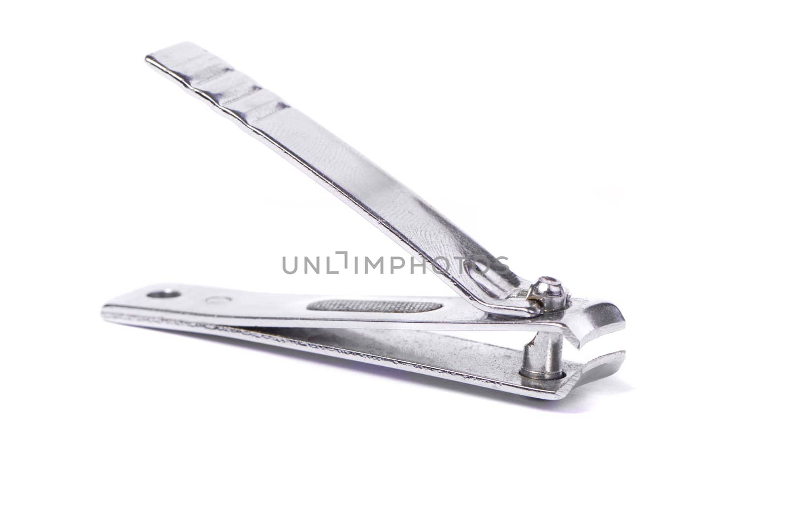 Close up view of a nail clipper isolated on a white background.