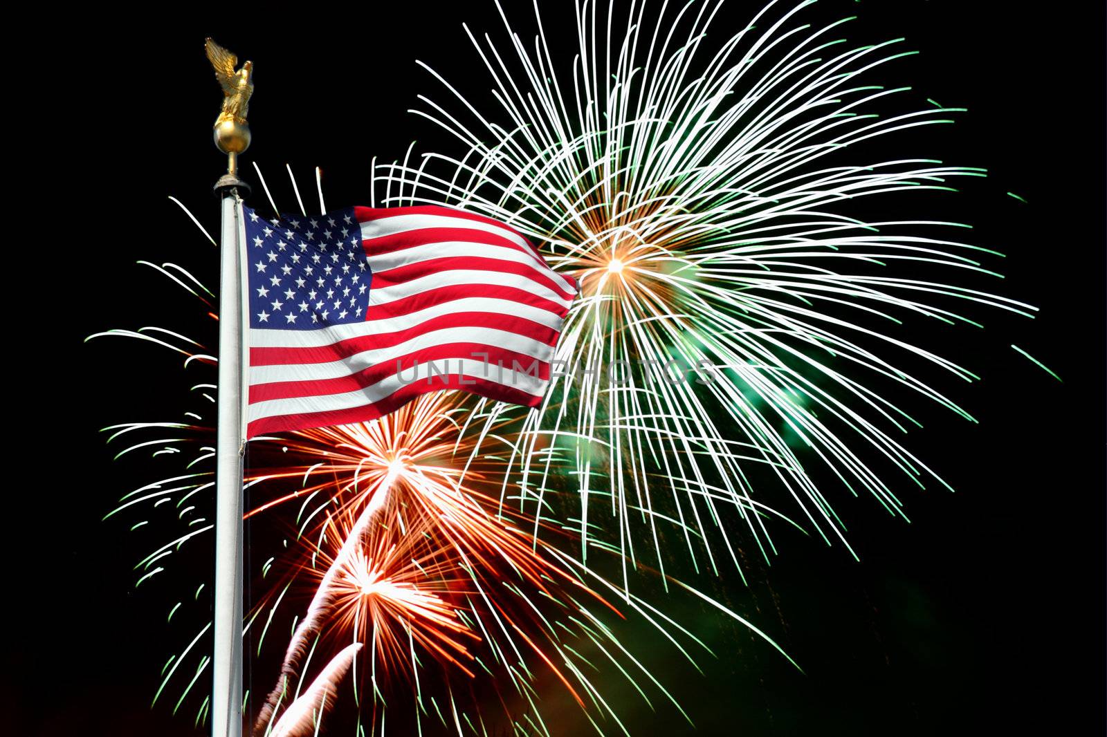 american flag with fireworks in background for celebrating