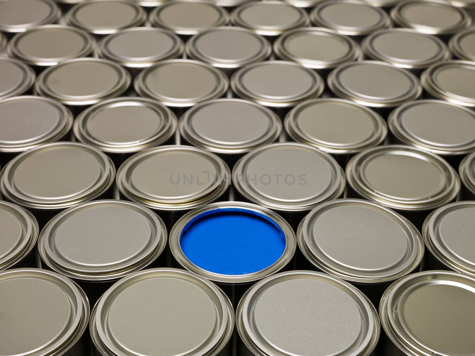 Full Frame of Paint Cans, one filled with blue paint