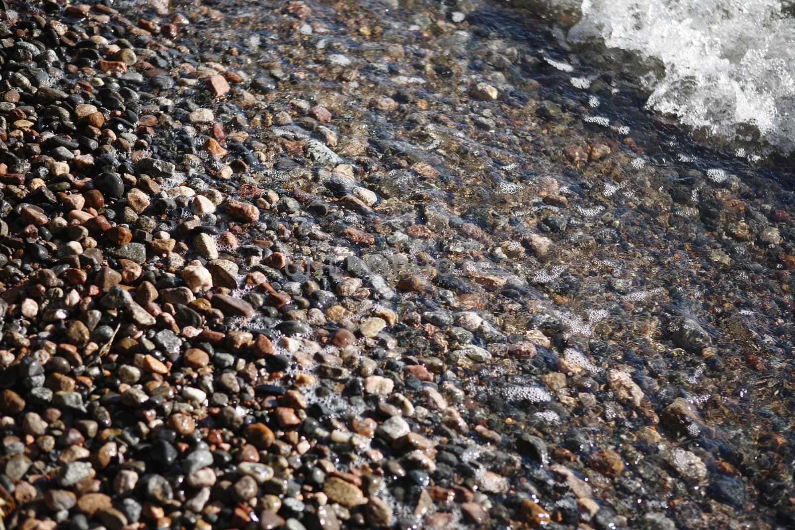 Small stones at seashore