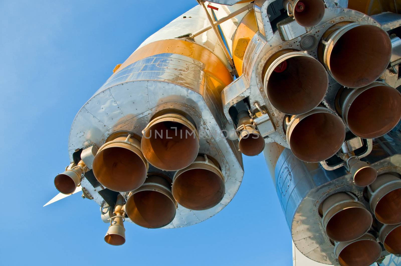 Nozzles space rocket Soyuz. Close-up on a background of clear blue sky.