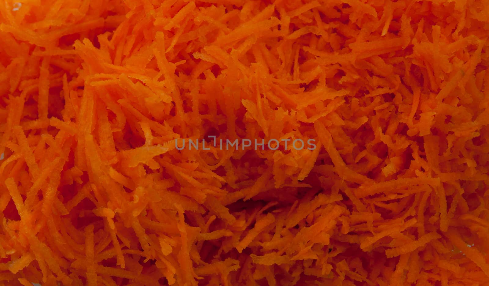 macro shot of carrot cutted into small parts