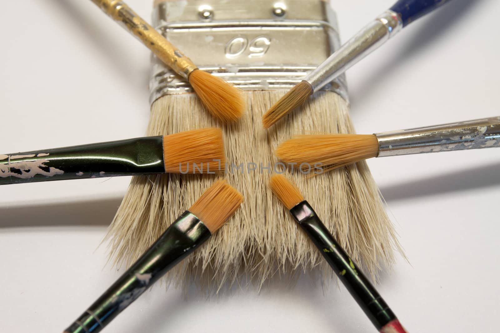 close up of different paintbrushes sizes, colors