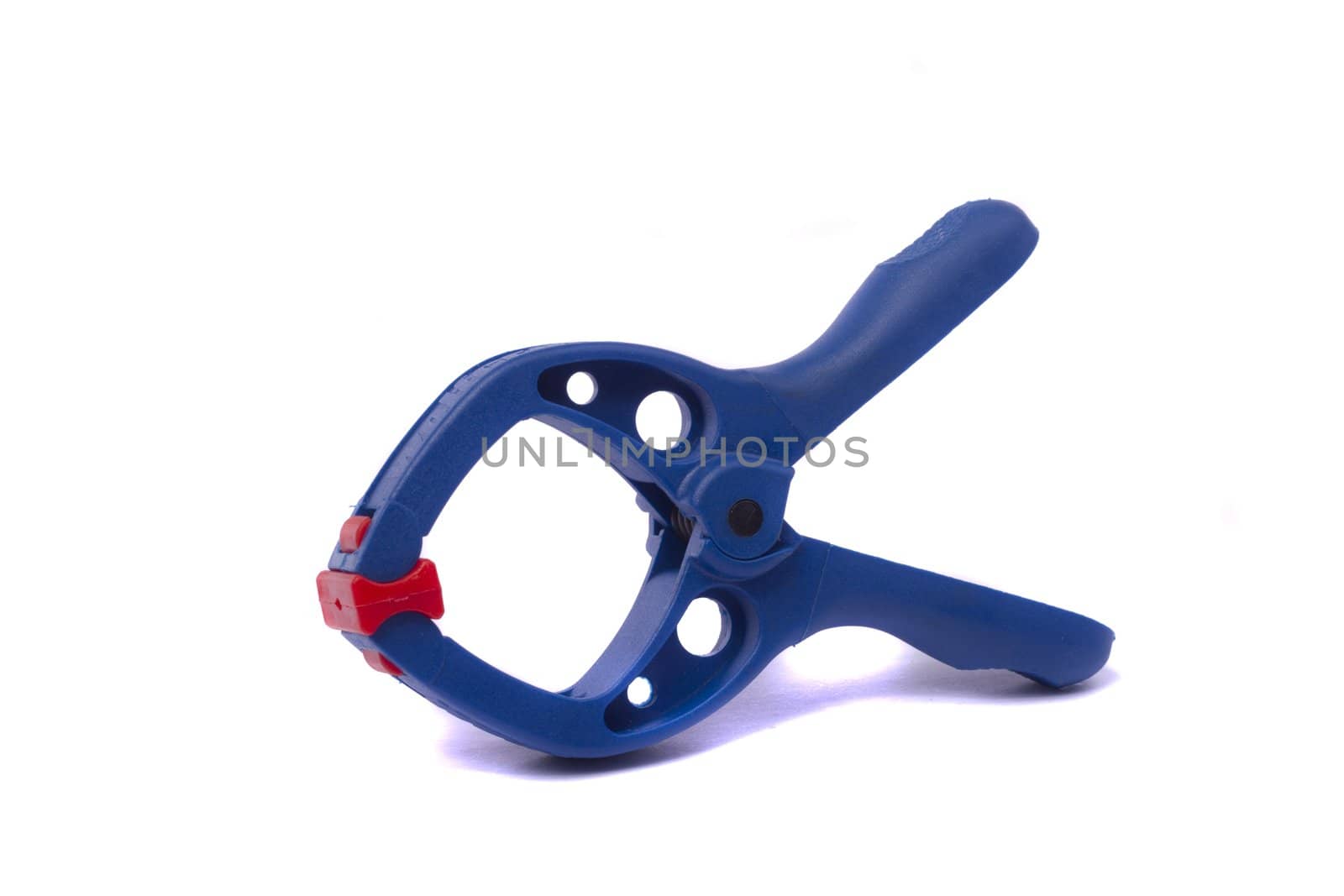 Close up view of a single clamp isolated on a white background.