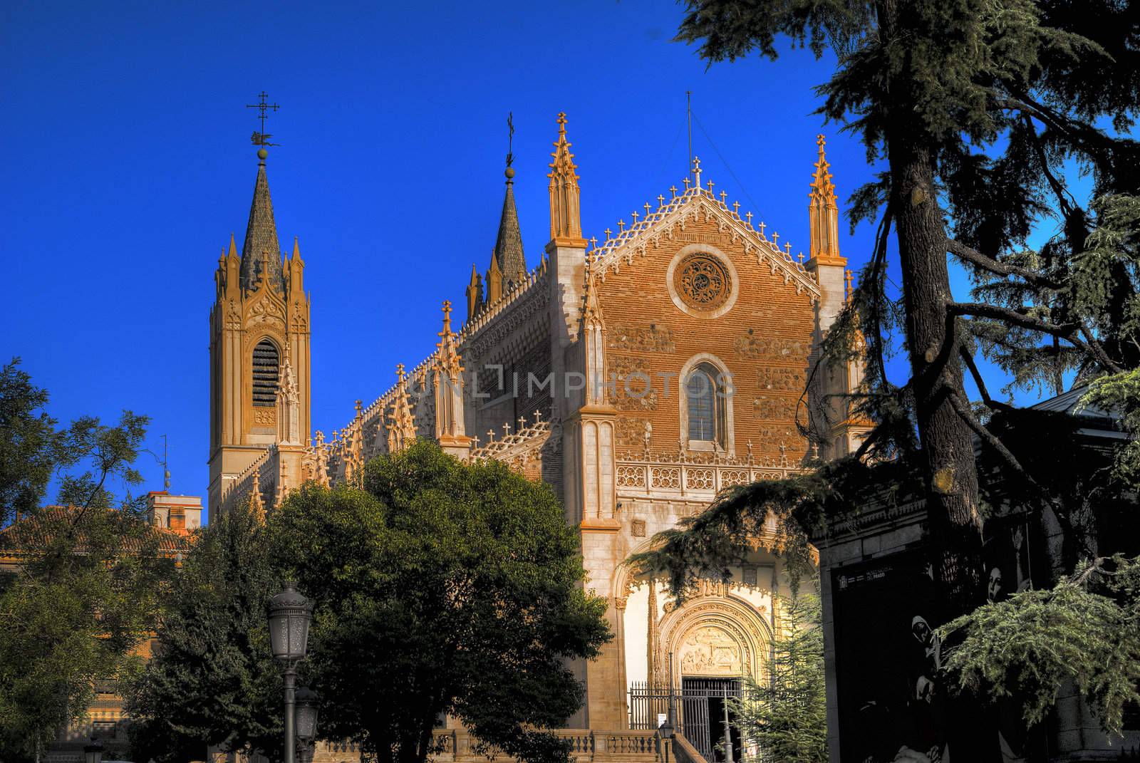 Parish church in rays of sun early, sunrise, Madrid