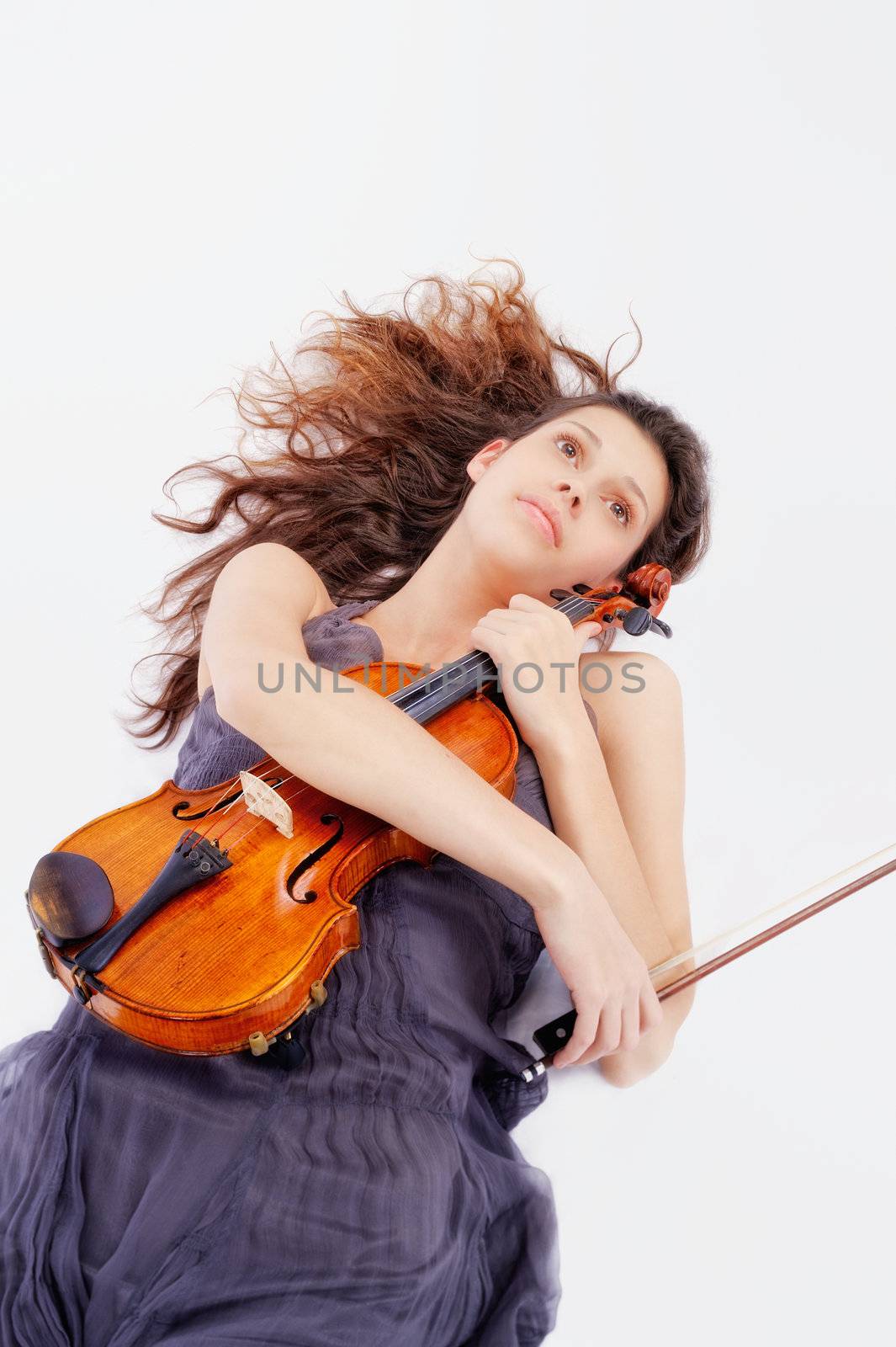 Violin player posing. Isolated over white background