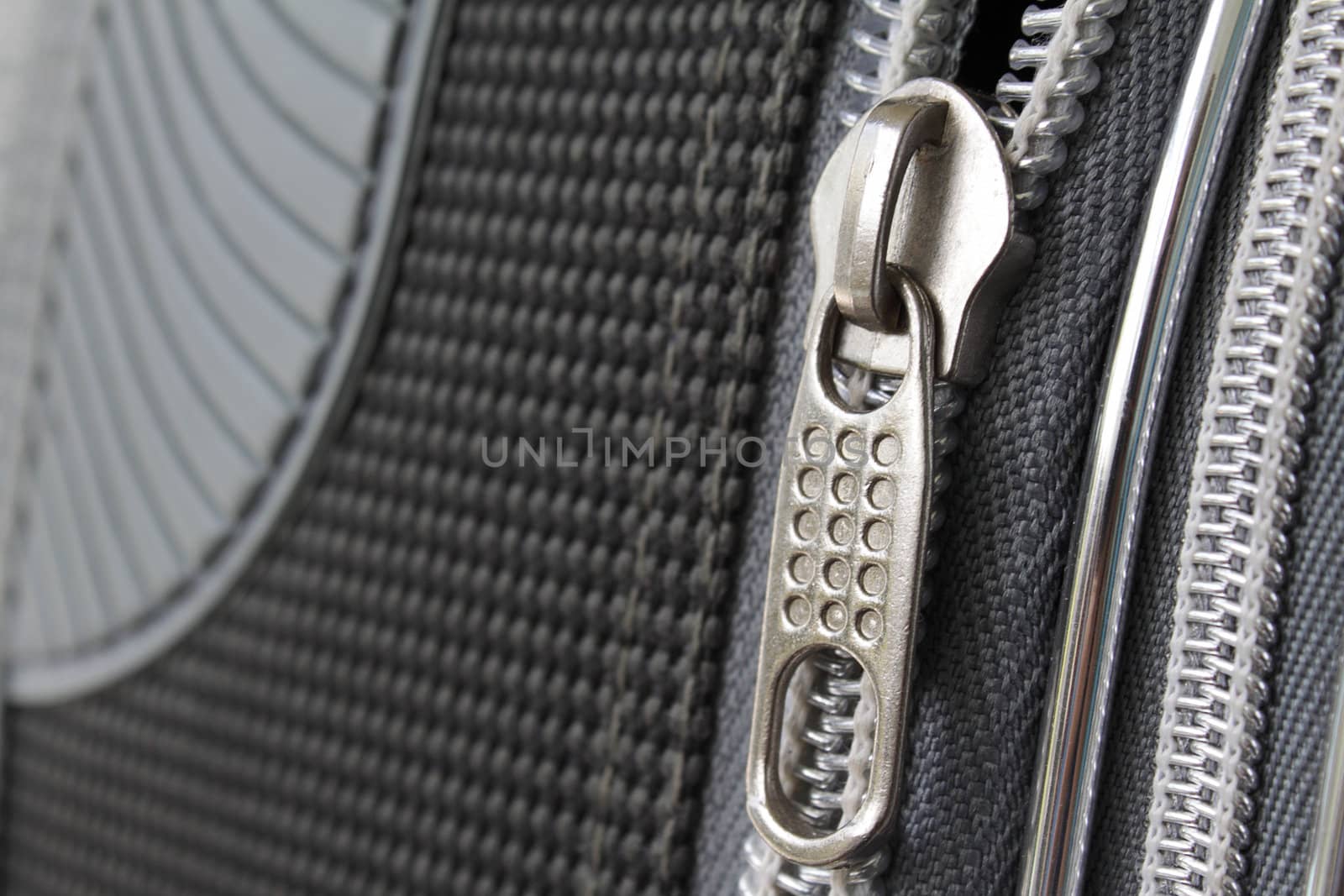 A zipper on suitcase by pulen