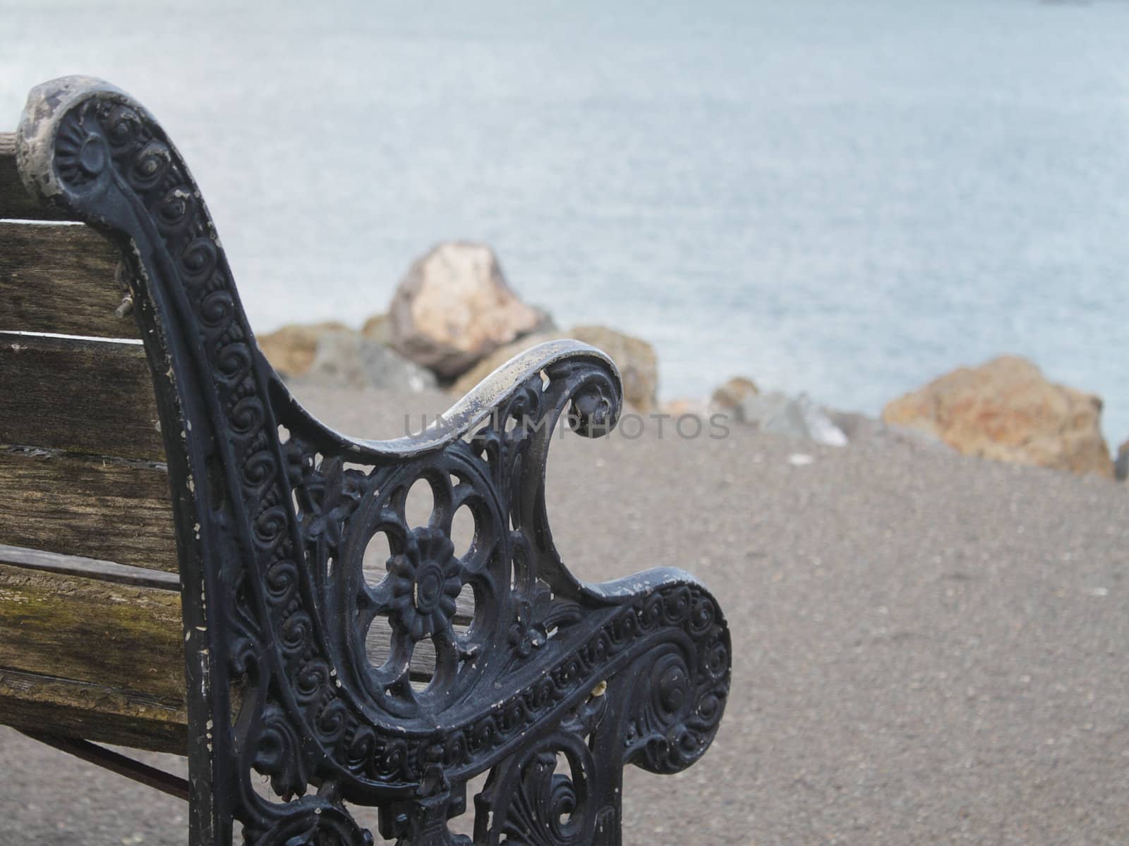 Old wooden bench on the wharf in the evening