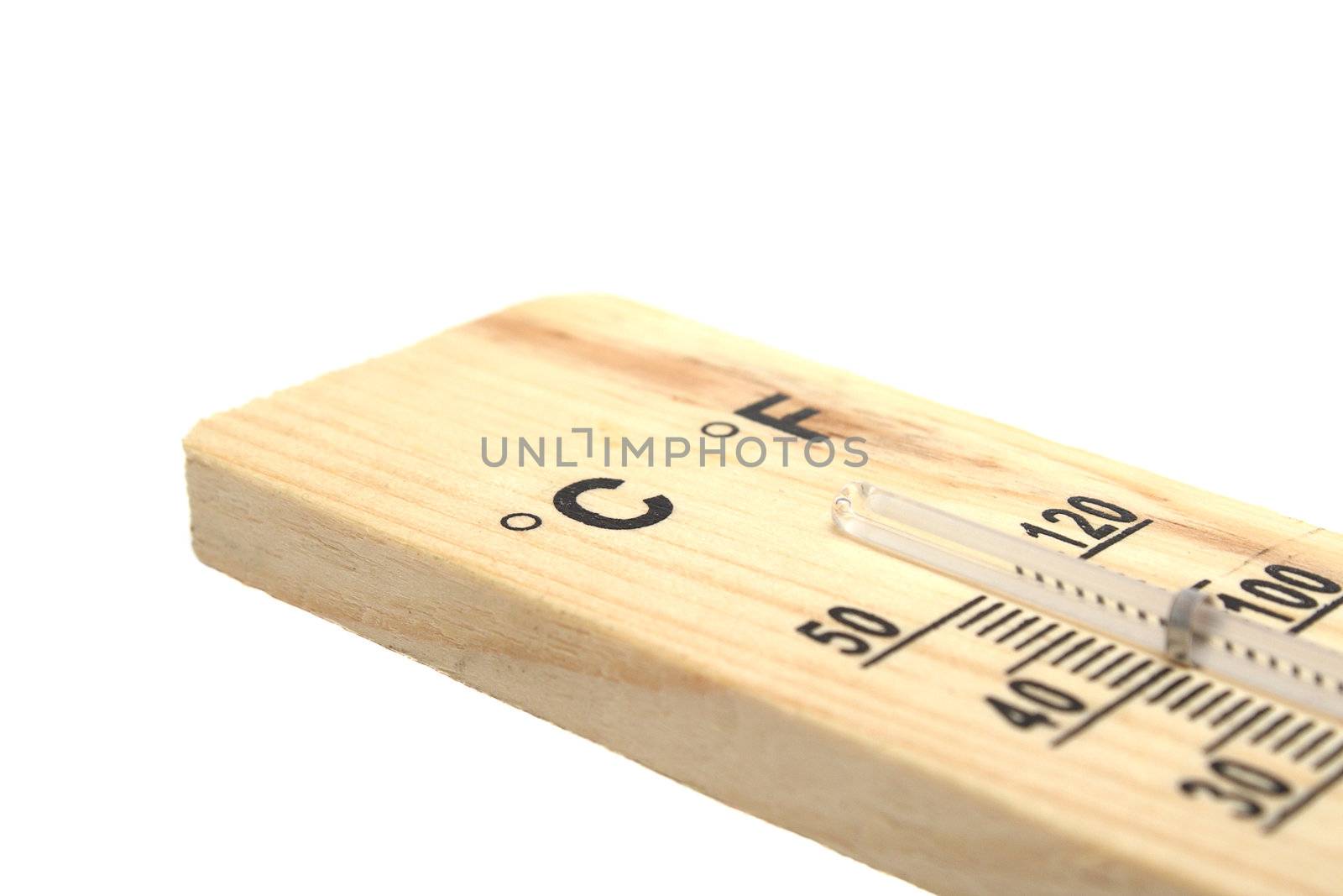 Wooden thermometer with black numbers on white background