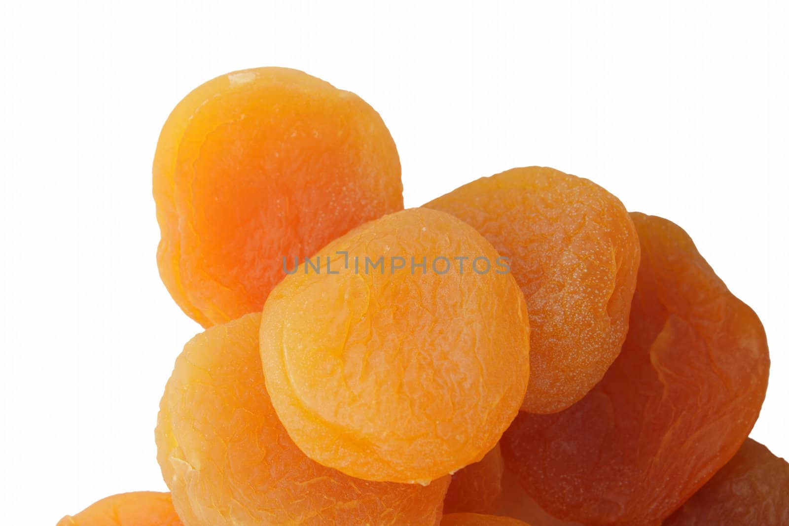 Group of dried apricot on white backgroun, view from above