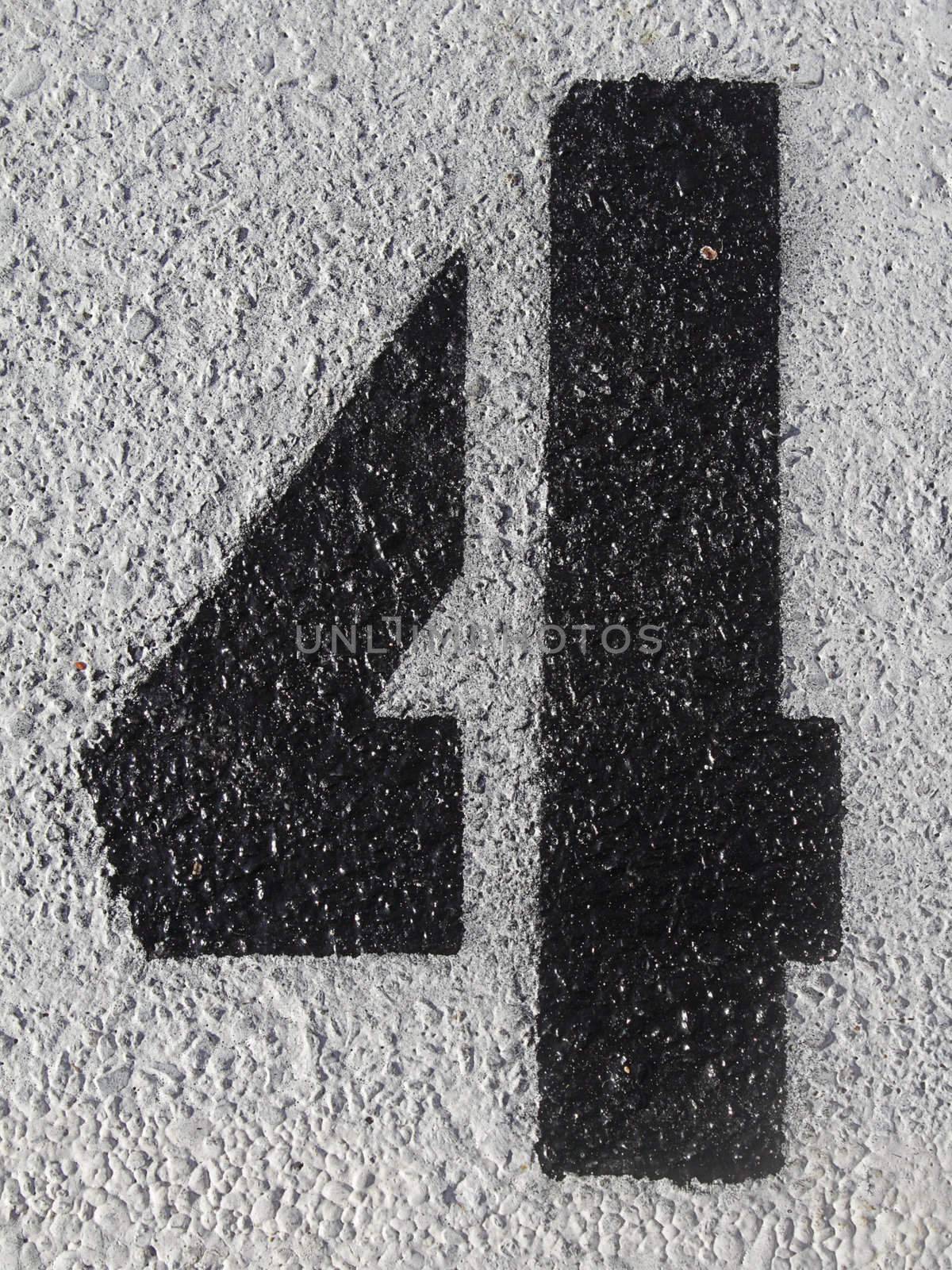 Number four on asphalt by pulen