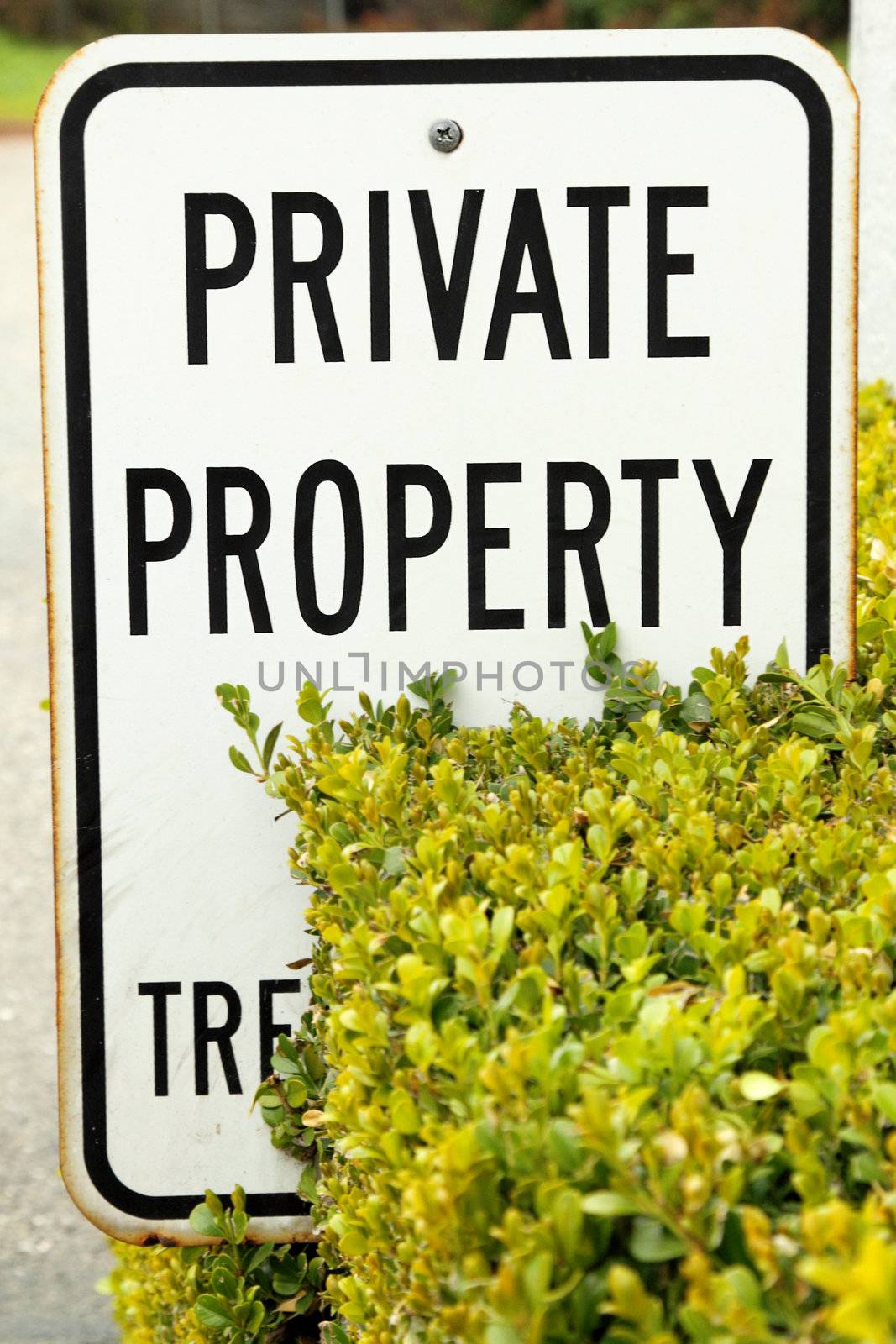 White private property sign with black letters