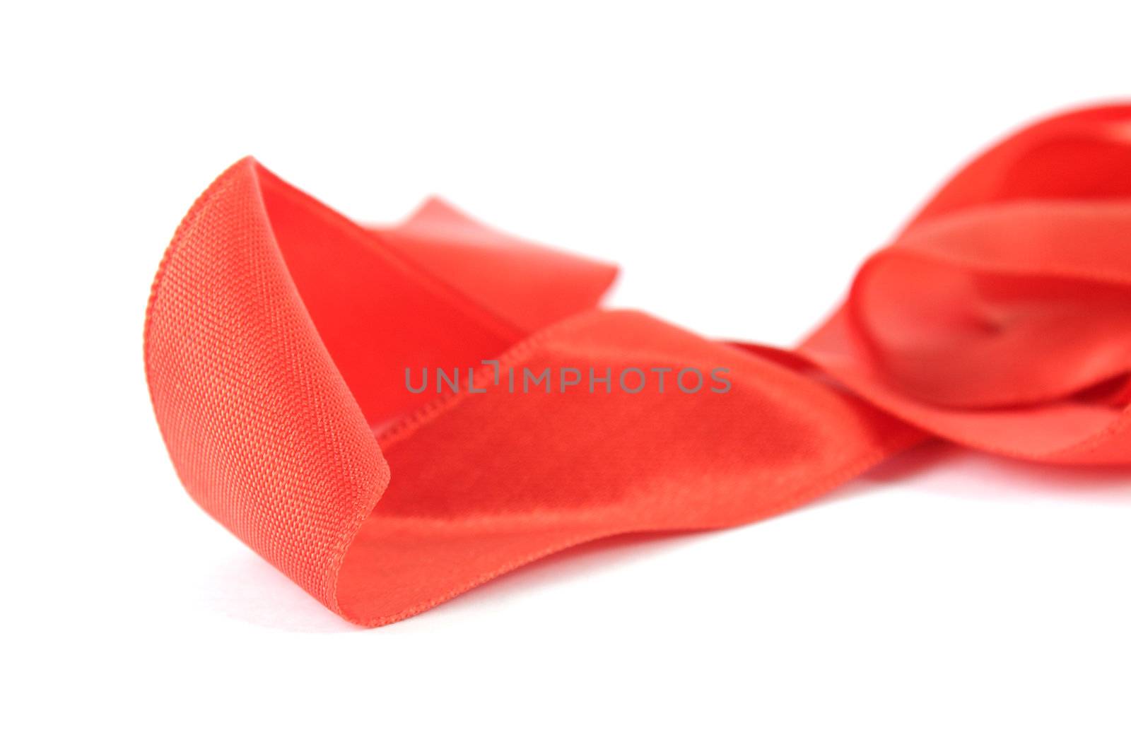 Red ribbon isolated on white background