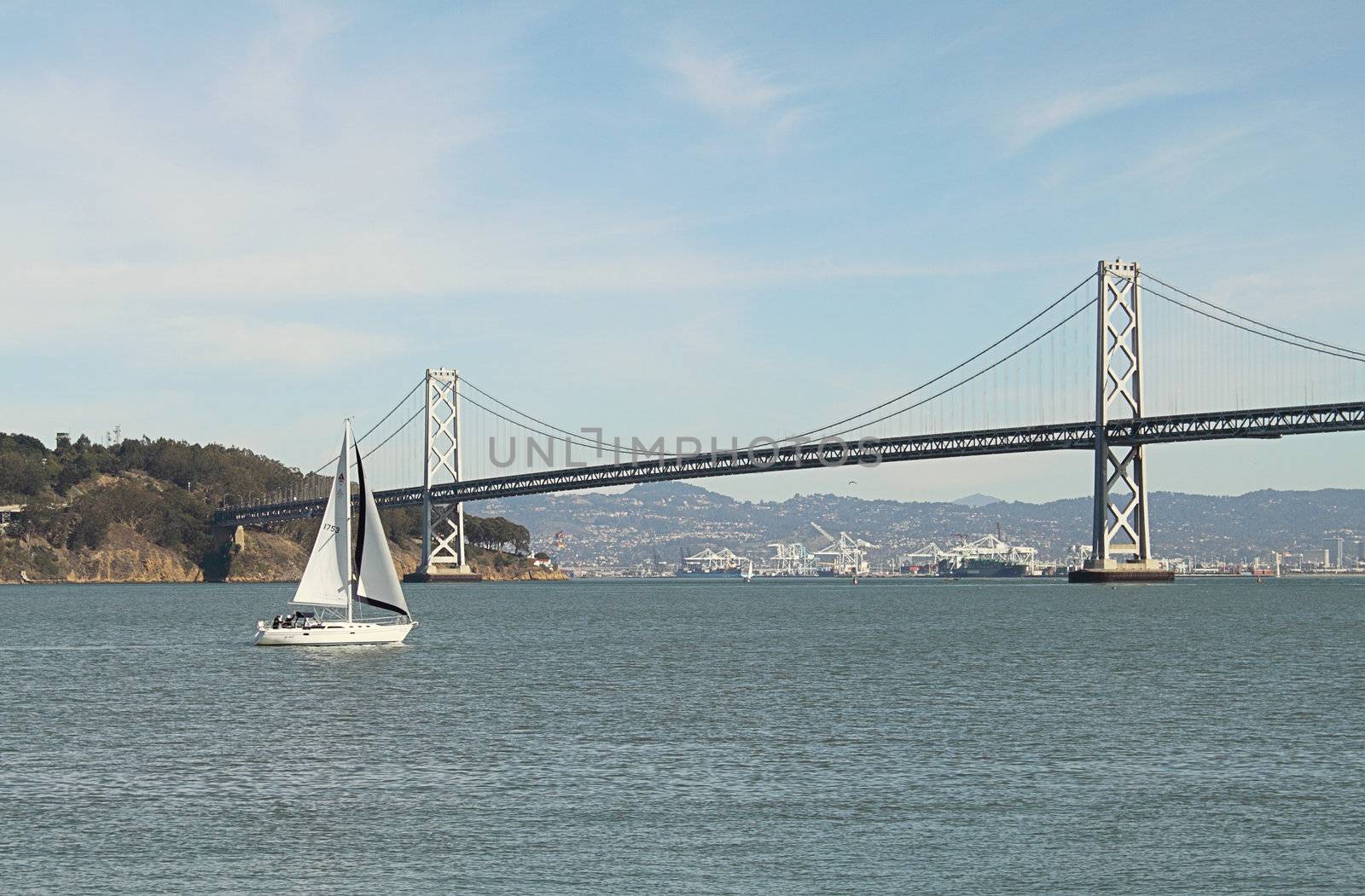 White sailboat, island and bridge by pulen