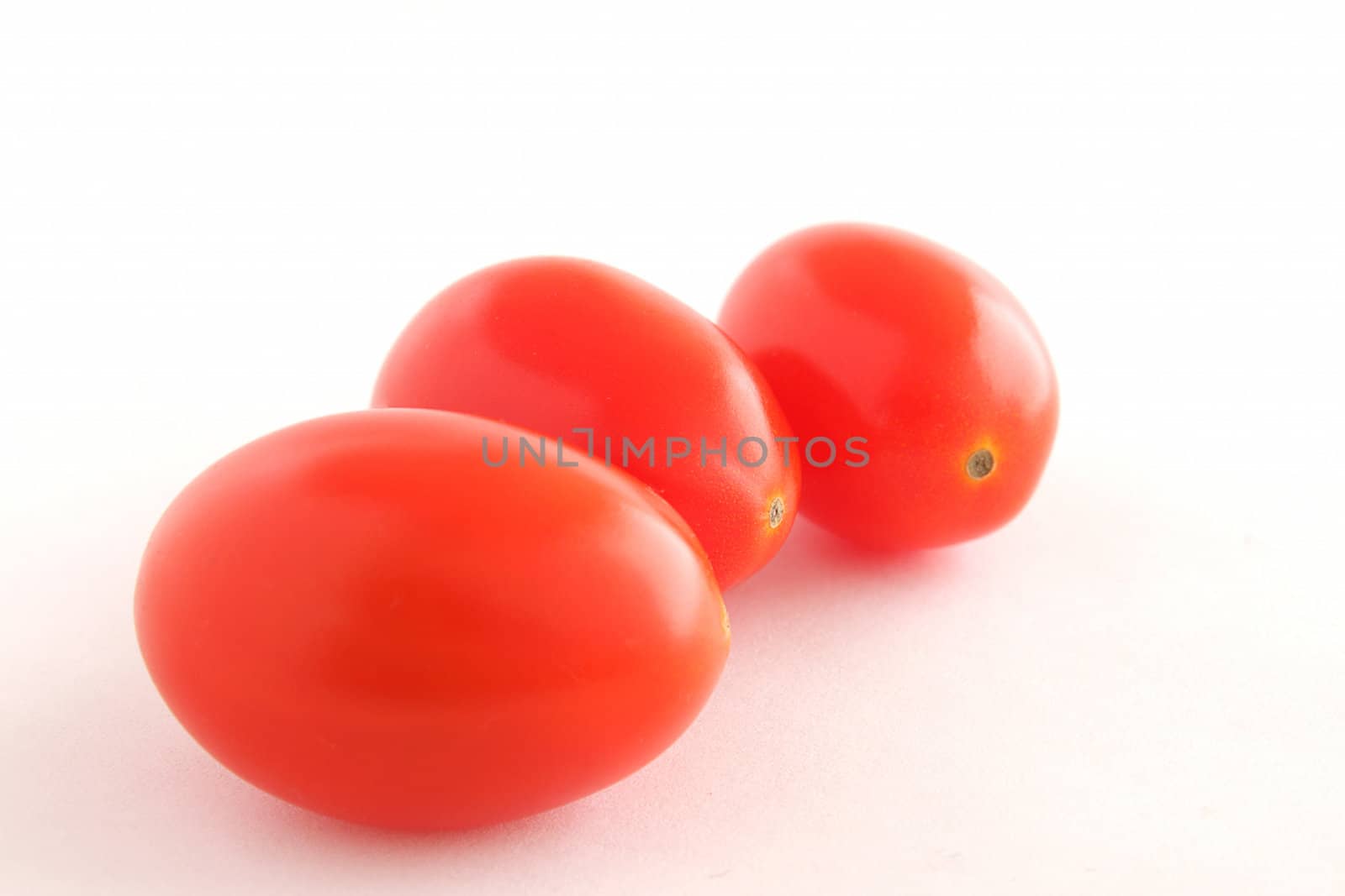 Three baby tomatoes by pulen