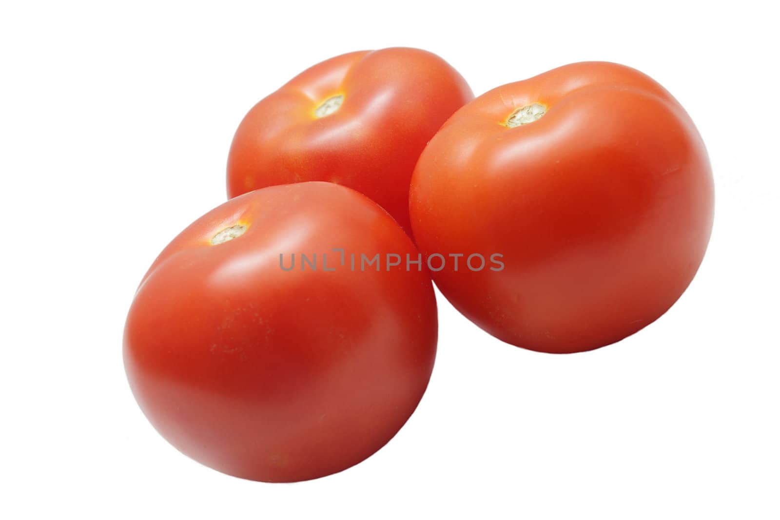 Three ripe tomatoes isolated on white background
