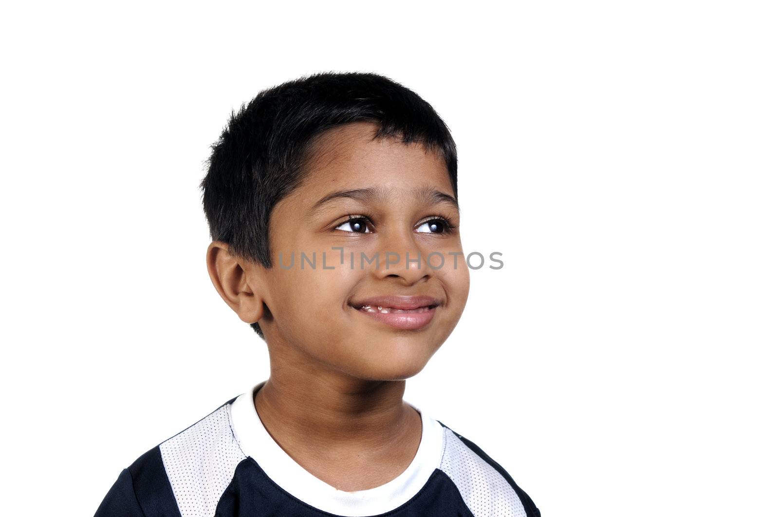 an handsome young indian kid thinking about something