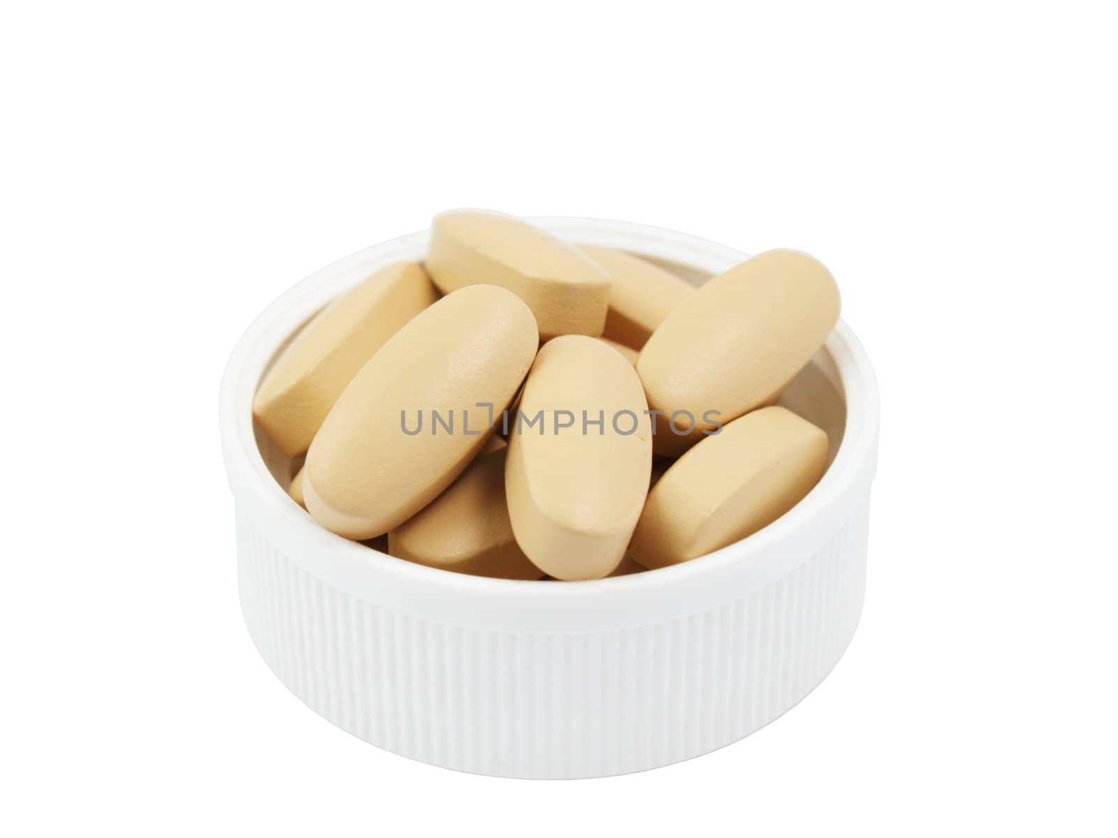 Multivitamin pills in the plastic cap by pulen