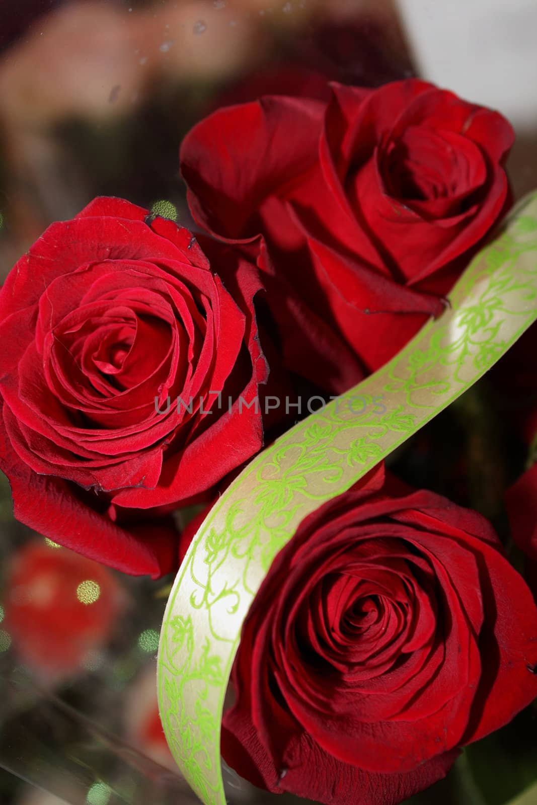 Three red roses in the wedding bouquet